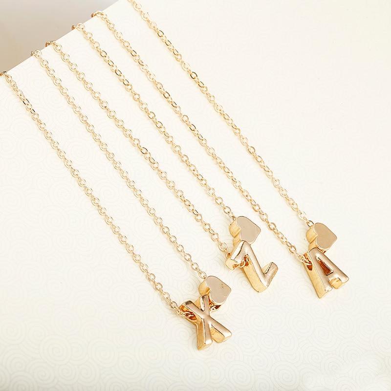 Tiny gold initial necklace gold letter necklace